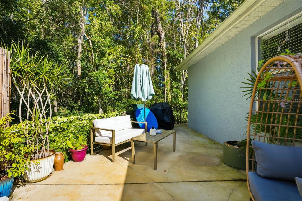 12505 Cavalier Court Hudson, FL 34669 - Photo 36 of 36 a view of a chairs and table in the patio