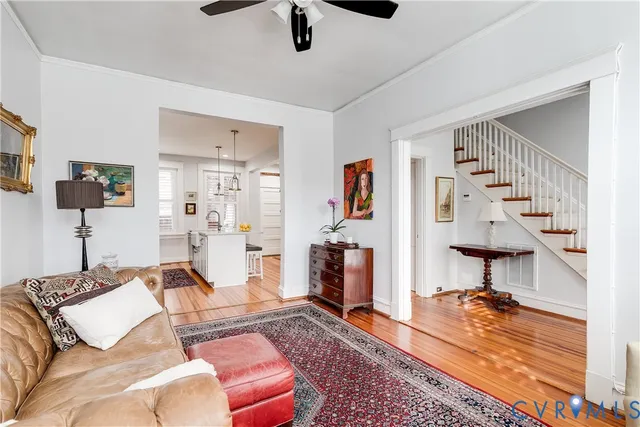 a living room with furniture and a rug