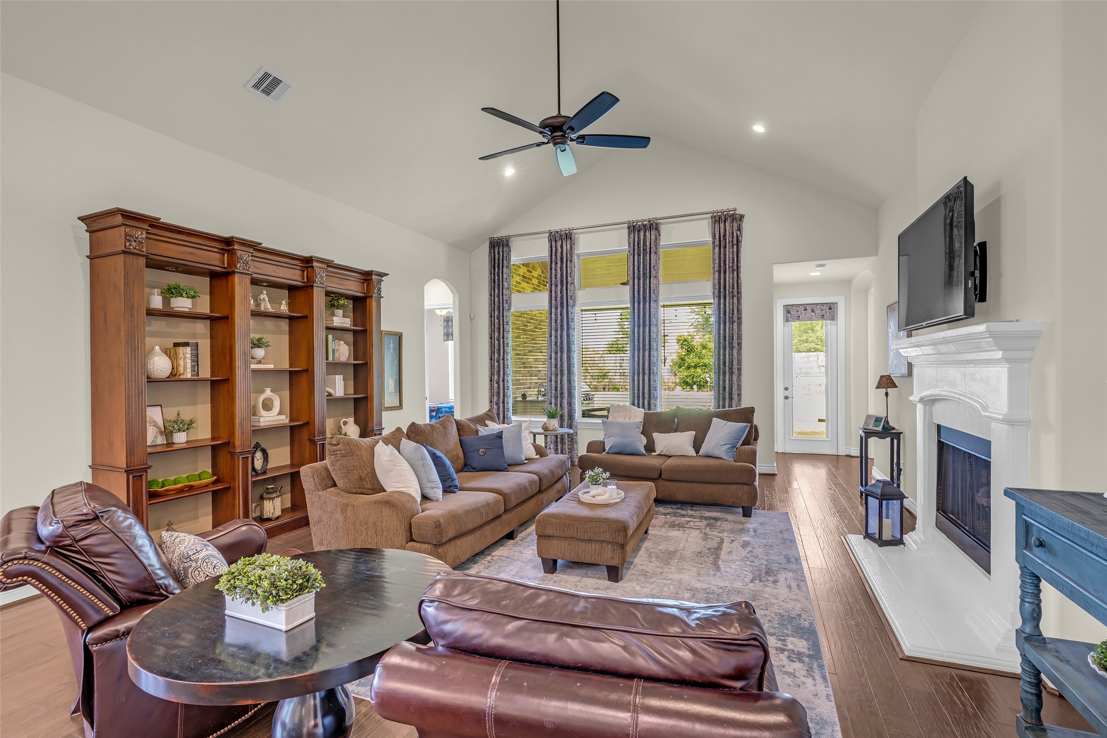 14003 South Evergreen Ridge Court Conroe, TX 77384 - Photo 18 of 43 Family room connects the home's main living spaces while separating the primary suite from two secondary bedrooms for added privacy.