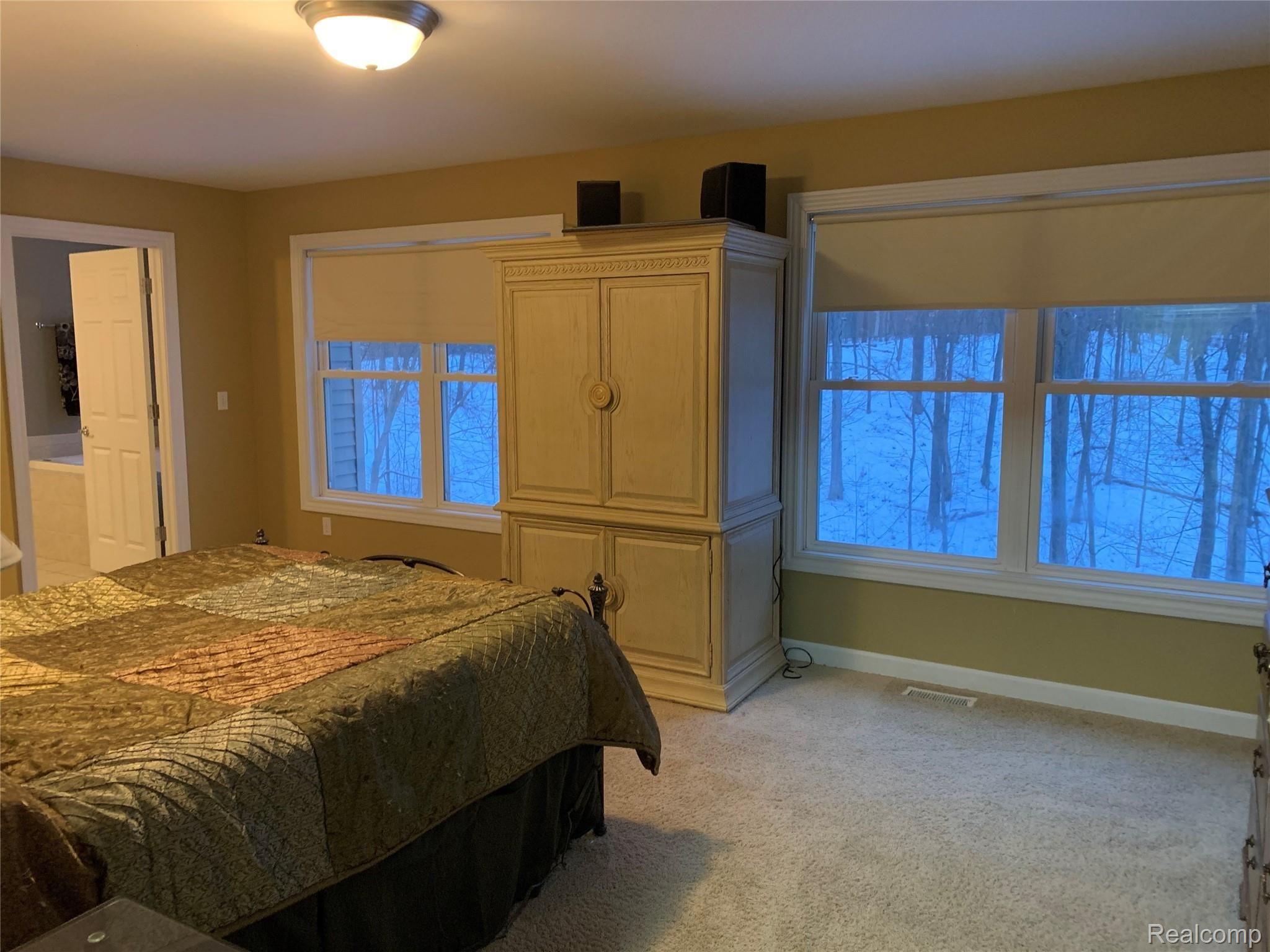 2716 West Coon Lake Road Howell, MI 48843 - Photo 22 of 26 Master bedroom