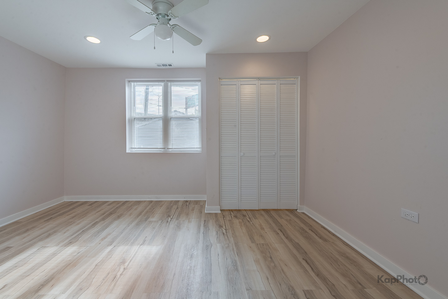 2029 South Canalport Avenue, Unit 2 Chicago, IL 60616 - Photo 21 of 28 wooden floor in an empty room with a window
