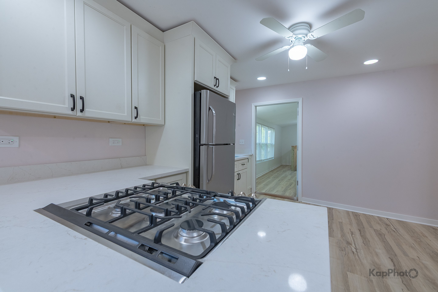 2029 South Canalport Avenue, Unit 2 Chicago, IL 60616 - Photo 9 of 28 a bedroom with a bed and a chandelier