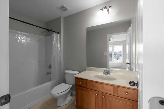 a view of entryway and hall with a door