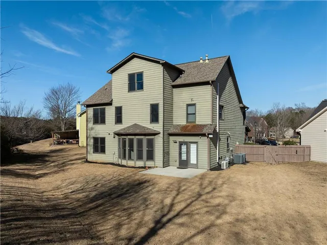 a view of backyard space and tree