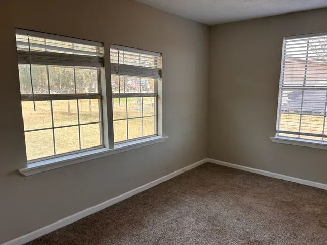 an empty room with a window