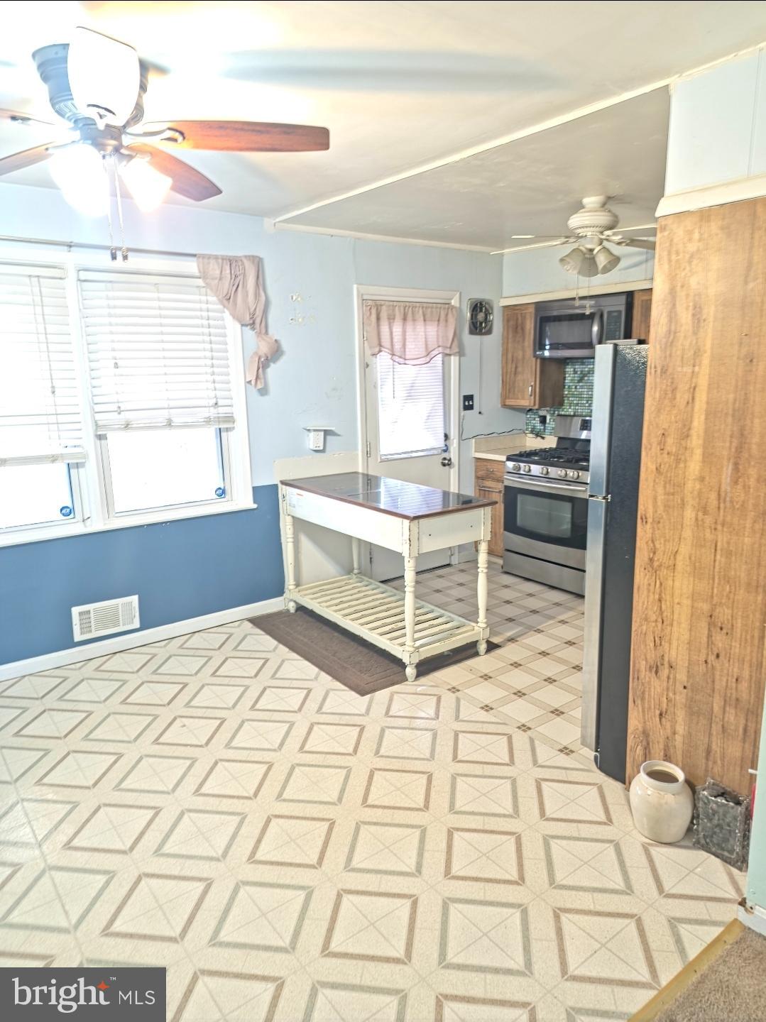 253 Southeastern Court Baltimore, MD 21221 - Photo 3 of 9 a room with a bed and a window