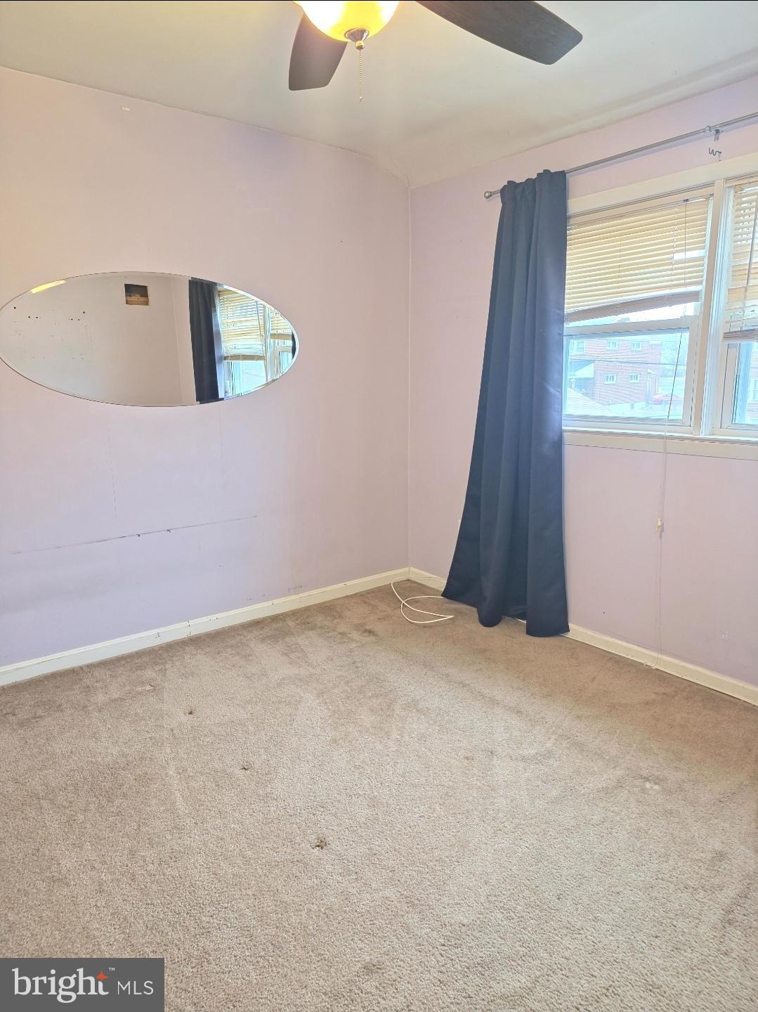 253 Southeastern Court Baltimore, MD 21221 - Photo 5 of 9 a view of an empty room with a window