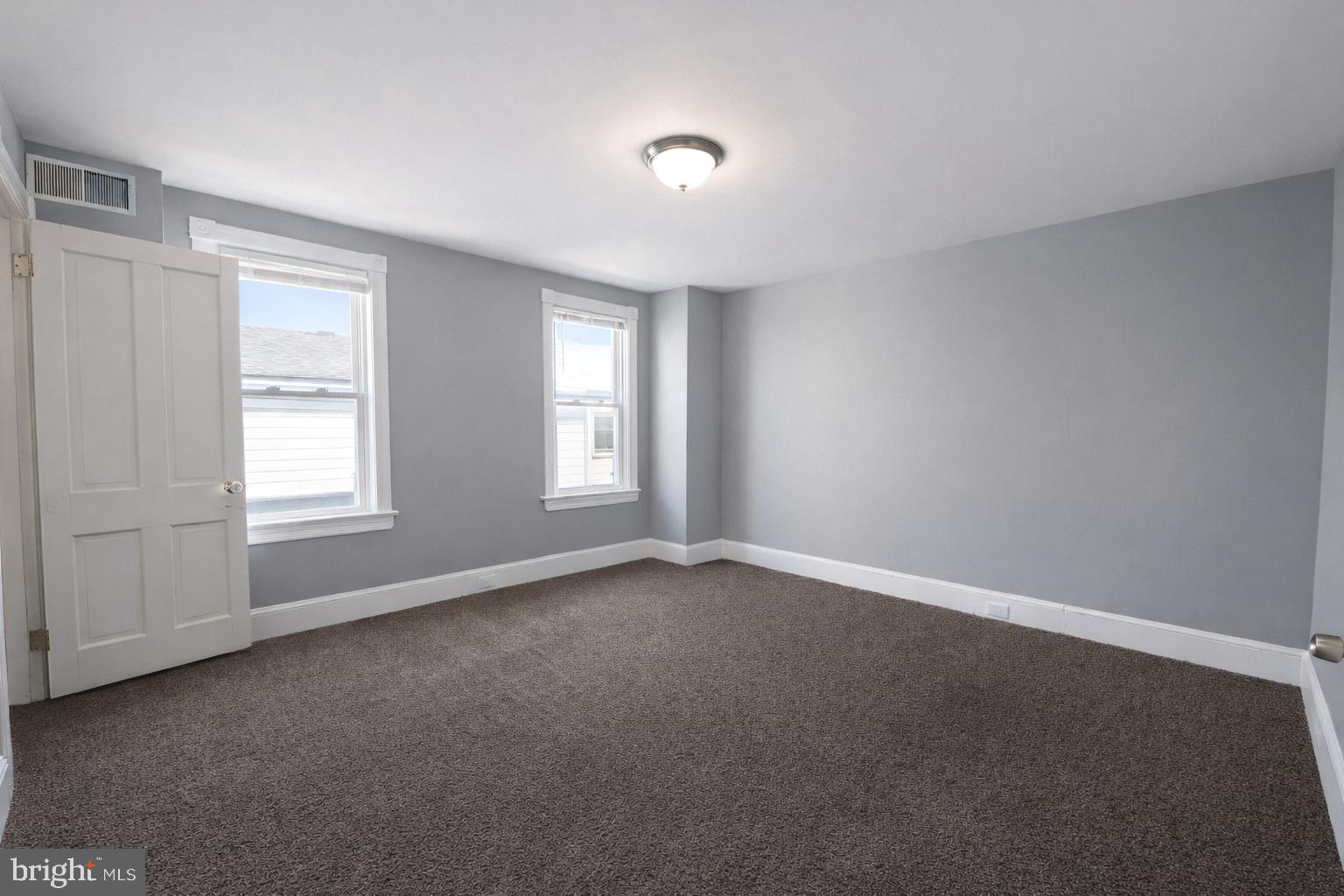 131 Bridgeboro Street Riverside, NJ 08075 - Photo 11 of 21 a view of an empty room with a window