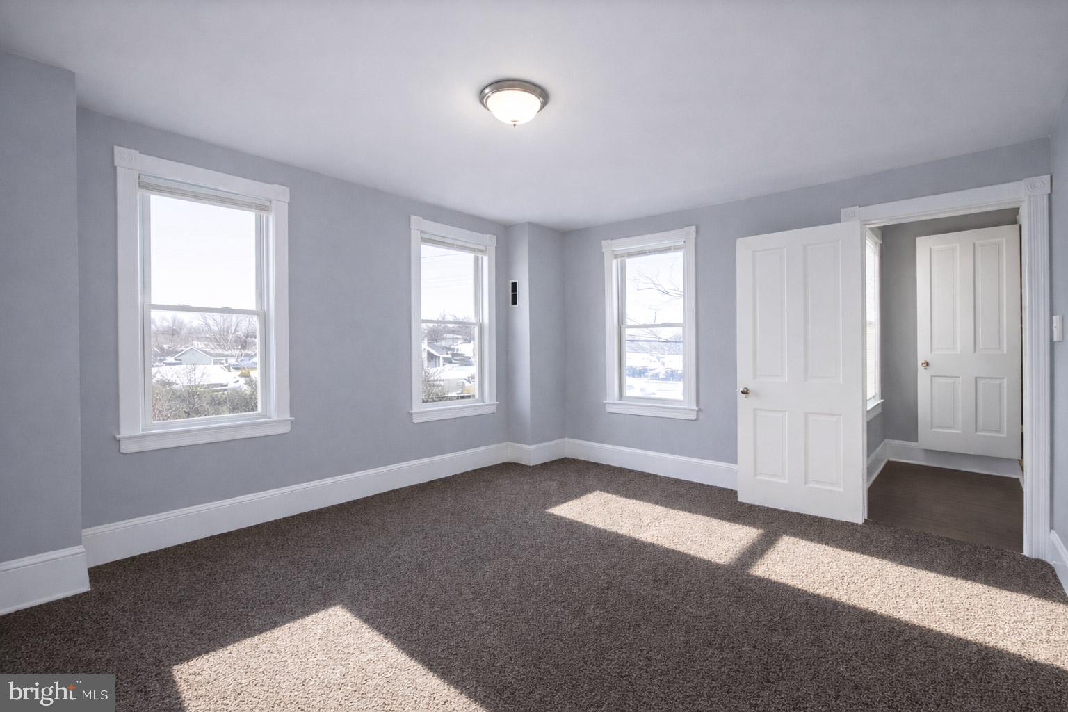 131 Bridgeboro Street Riverside, NJ 08075 - Photo 12 of 21 a view of an empty room with a window