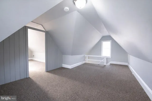 a bathroom with a sink toilet and vanity