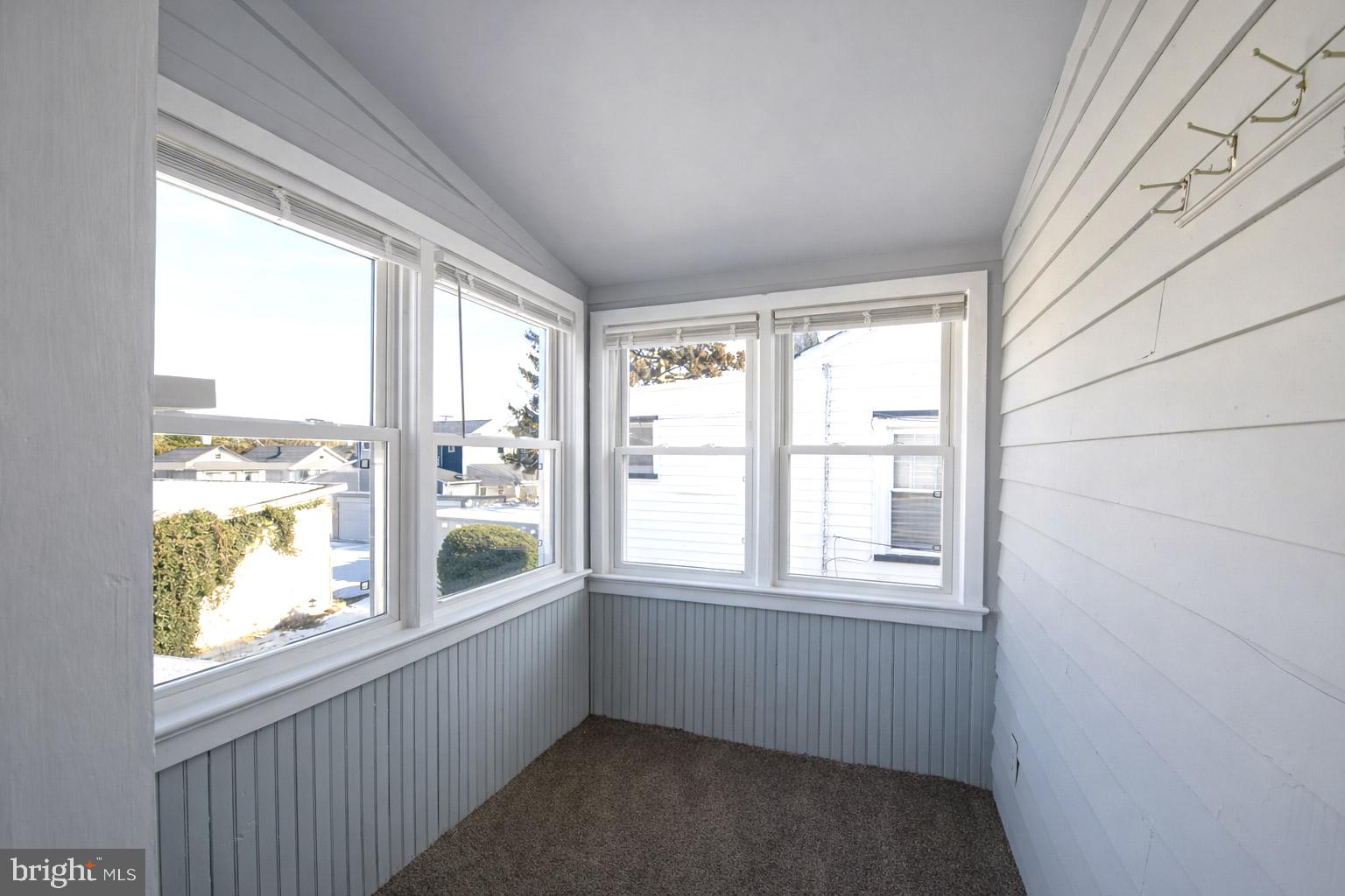131 Bridgeboro Street Riverside, NJ 08075 - Photo 10 of 21 a view of an empty room with a window