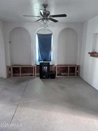 a kitchen with a stove sink and a refrigerator