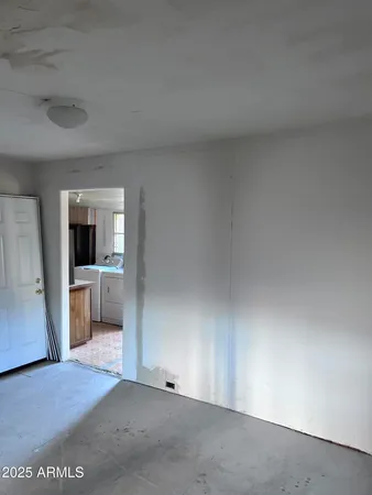 a view of livingroom with front door