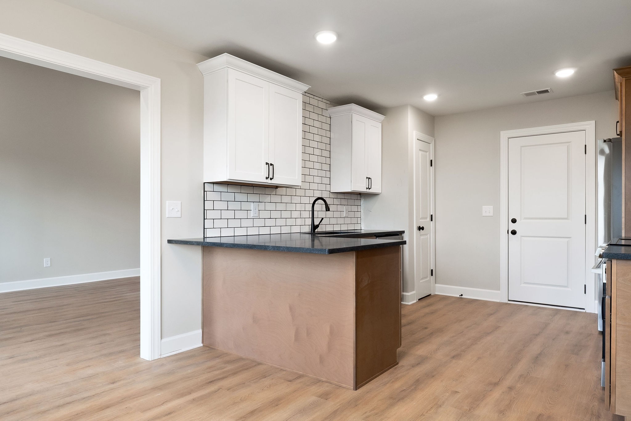 3535 Keltonburg Road Smithville, TN 37166 - Photo 10 of 37 a view of kitchen with wooden cabinets