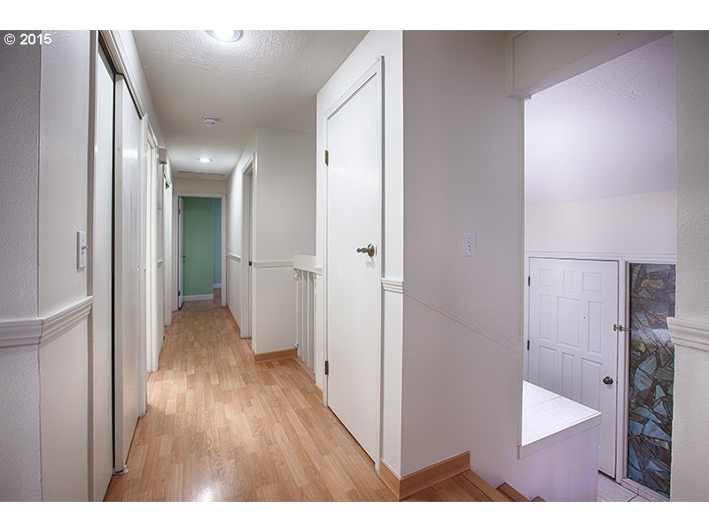 31 Southwest Taylors Ferry Road Portland, OR 97219 - Photo 10 of 23 a view of hallway with wooden floor