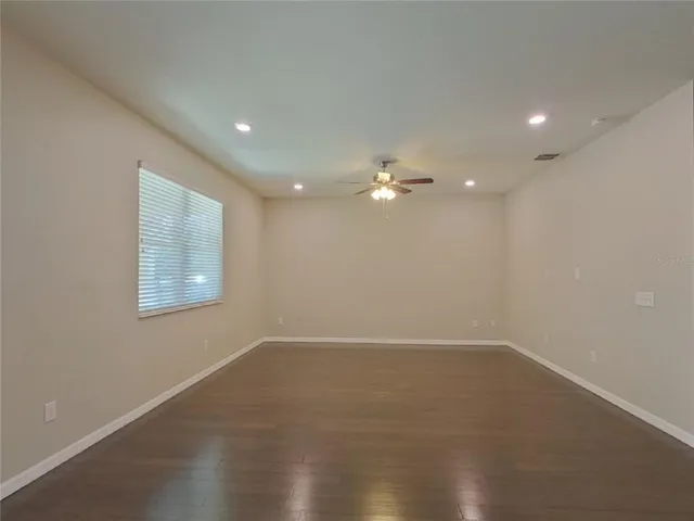 an empty room with a empty space and window