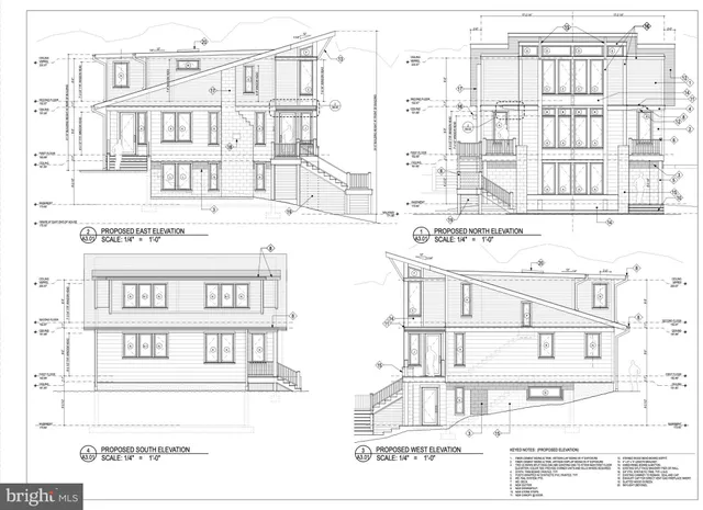 a black and white photo of a white building