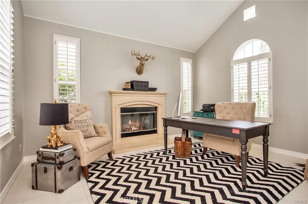 3 Weldon Heights Ladera Ranch, CA 92694 - Photo 6 of 13 a living room with furniture a window and a fireplace