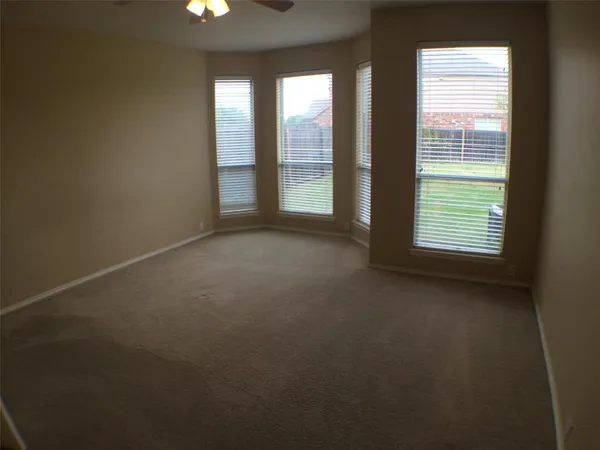 an empty room with windows