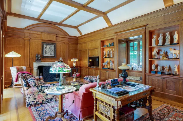 a view of a dining room with furniture wooden floor and chandelier