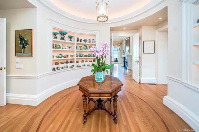 a view of a swimming pool with lounge chairs in patio