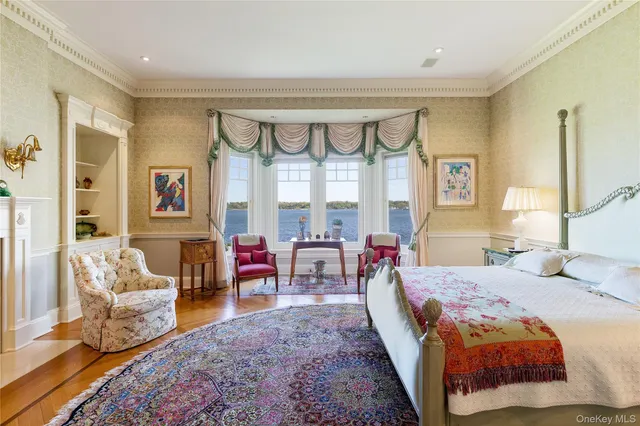 an aerial view of a house with yard swimming pool and outdoor seating