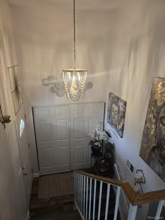 a kitchen with stainless steel appliances granite countertop a stove refrigerator sink and cabinets