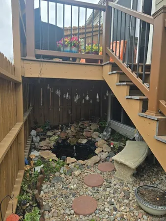 a bedroom with a bed dresser and a window