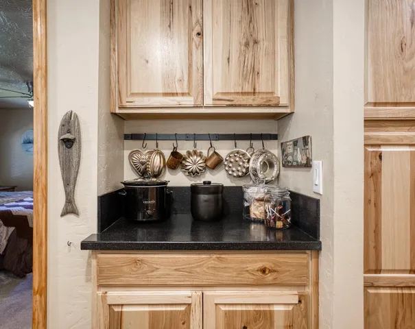 an aerial view of a house with yard swimming pool and outdoor seating