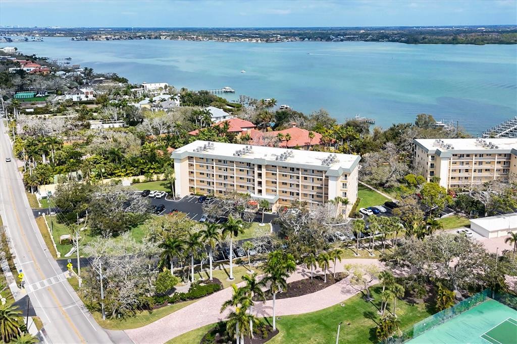 8625 Midnight Pass Road, Unit 506B Sarasota, FL 34242 - Photo 3 of 37 a view of lake with city view