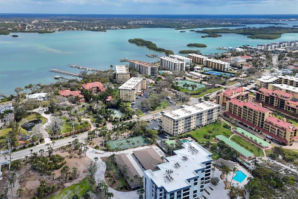 8625 Midnight Pass Road, Unit 506B Sarasota, FL 34242 - Photo 33 of 37 a view of a city and ocean view