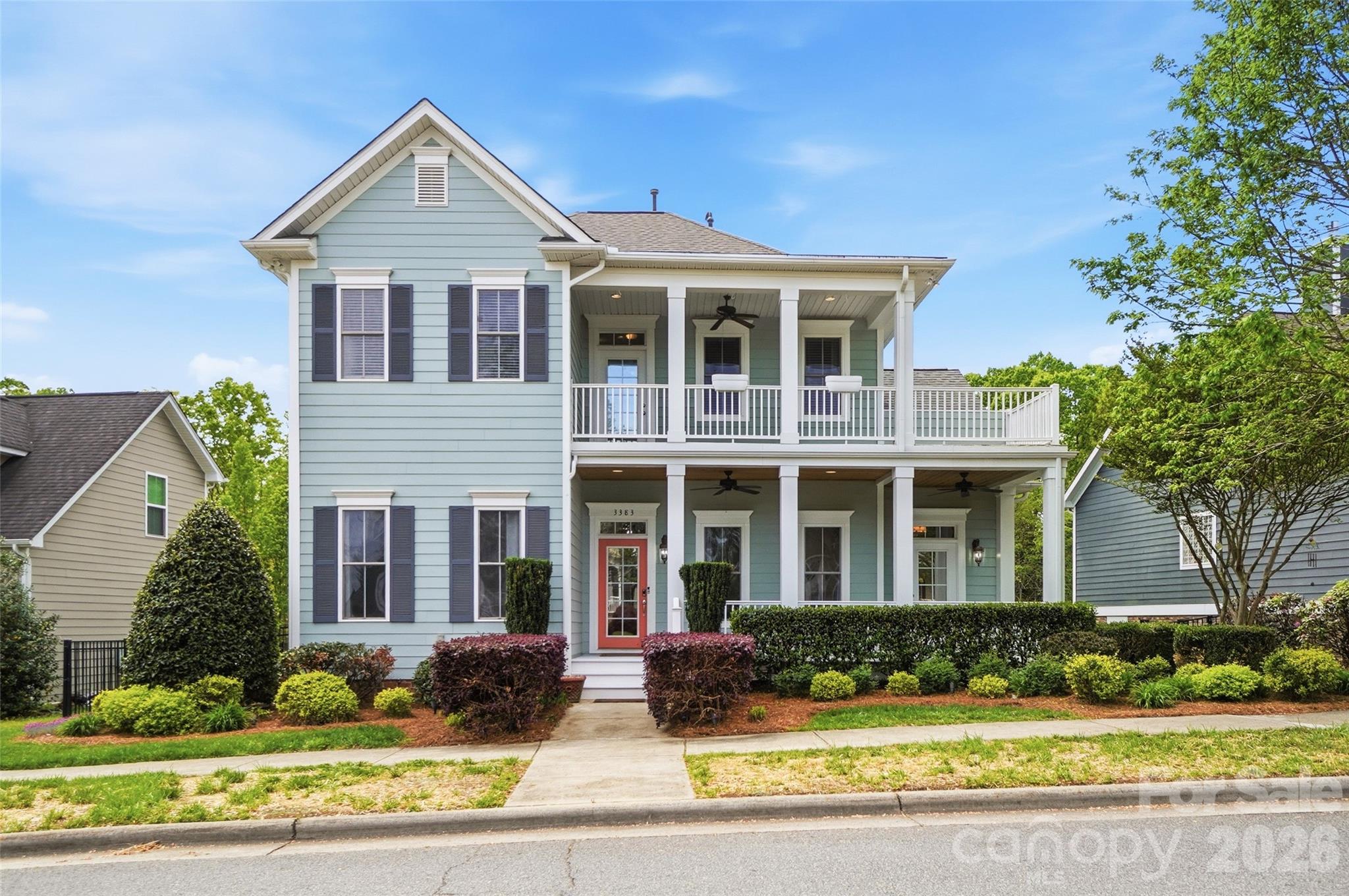 front view of a house with a yard