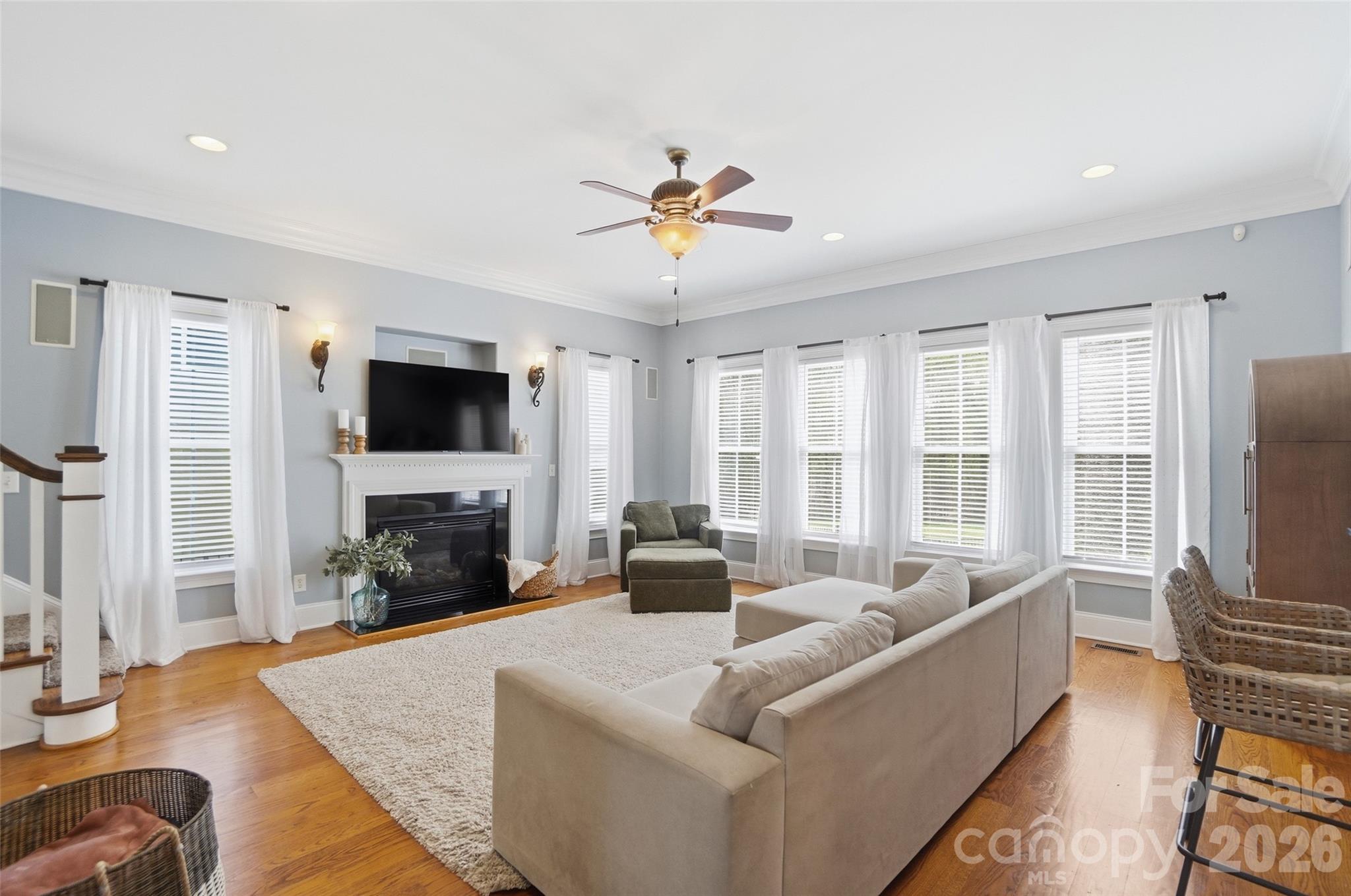3383 Keady Mill Loop Kannapolis, NC 28081 - Photo 13 of 47 a living room with fireplace furniture and a flat screen tv