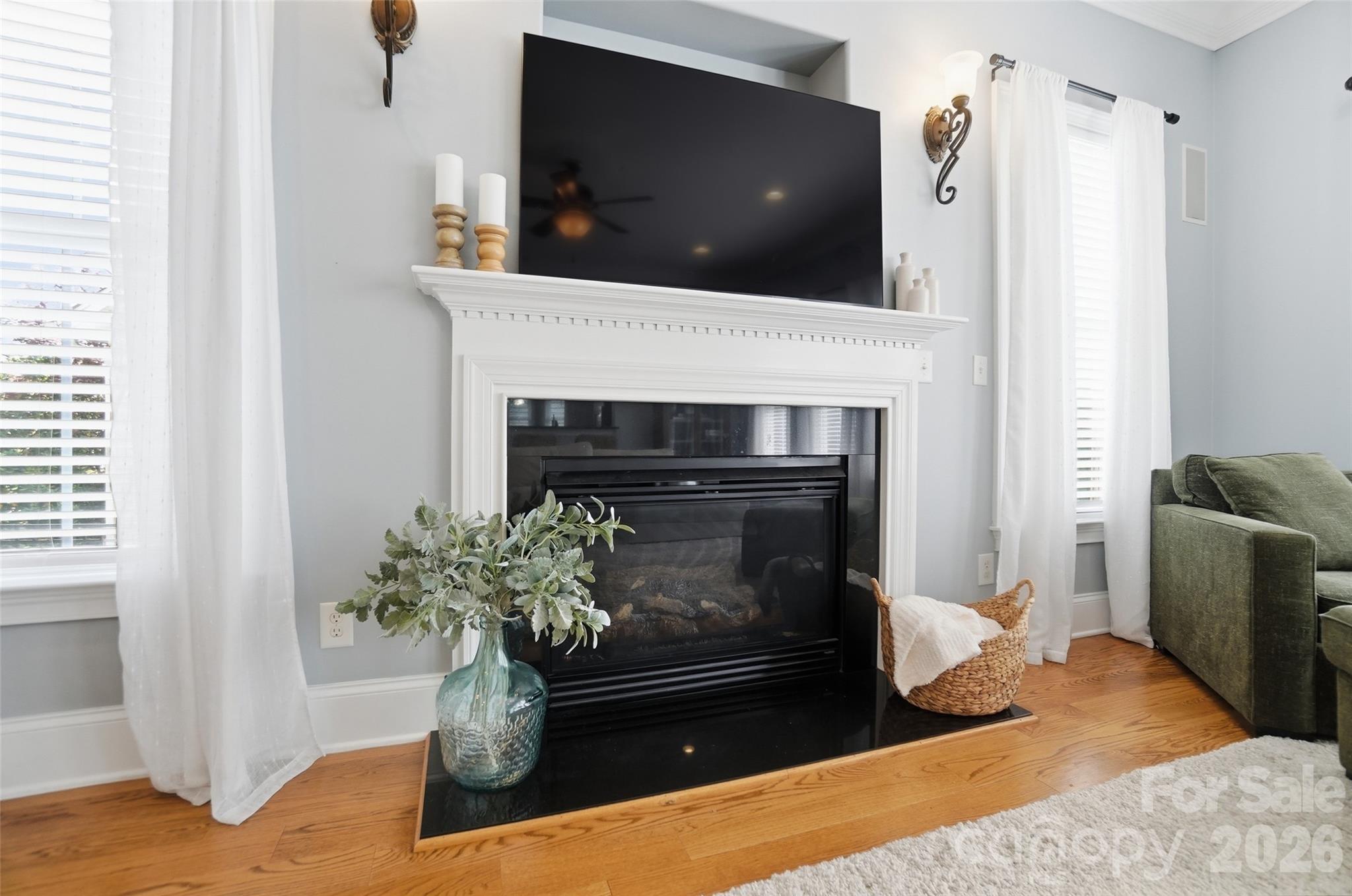 3383 Keady Mill Loop Kannapolis, NC 28081 - Photo 15 of 47 a living room with furniture and a fireplace