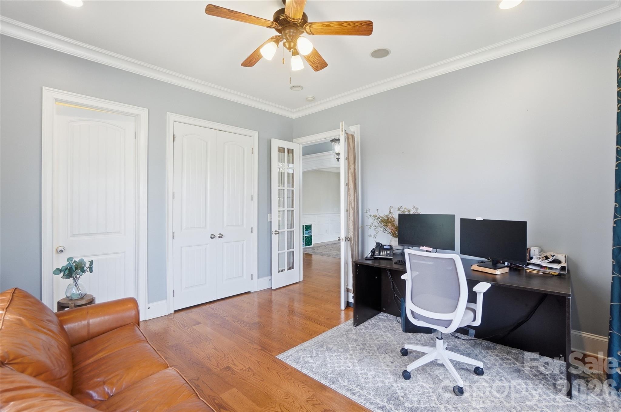 3383 Keady Mill Loop Kannapolis, NC 28081 - Photo 17 of 47 a workspace with furniture and wooden floor