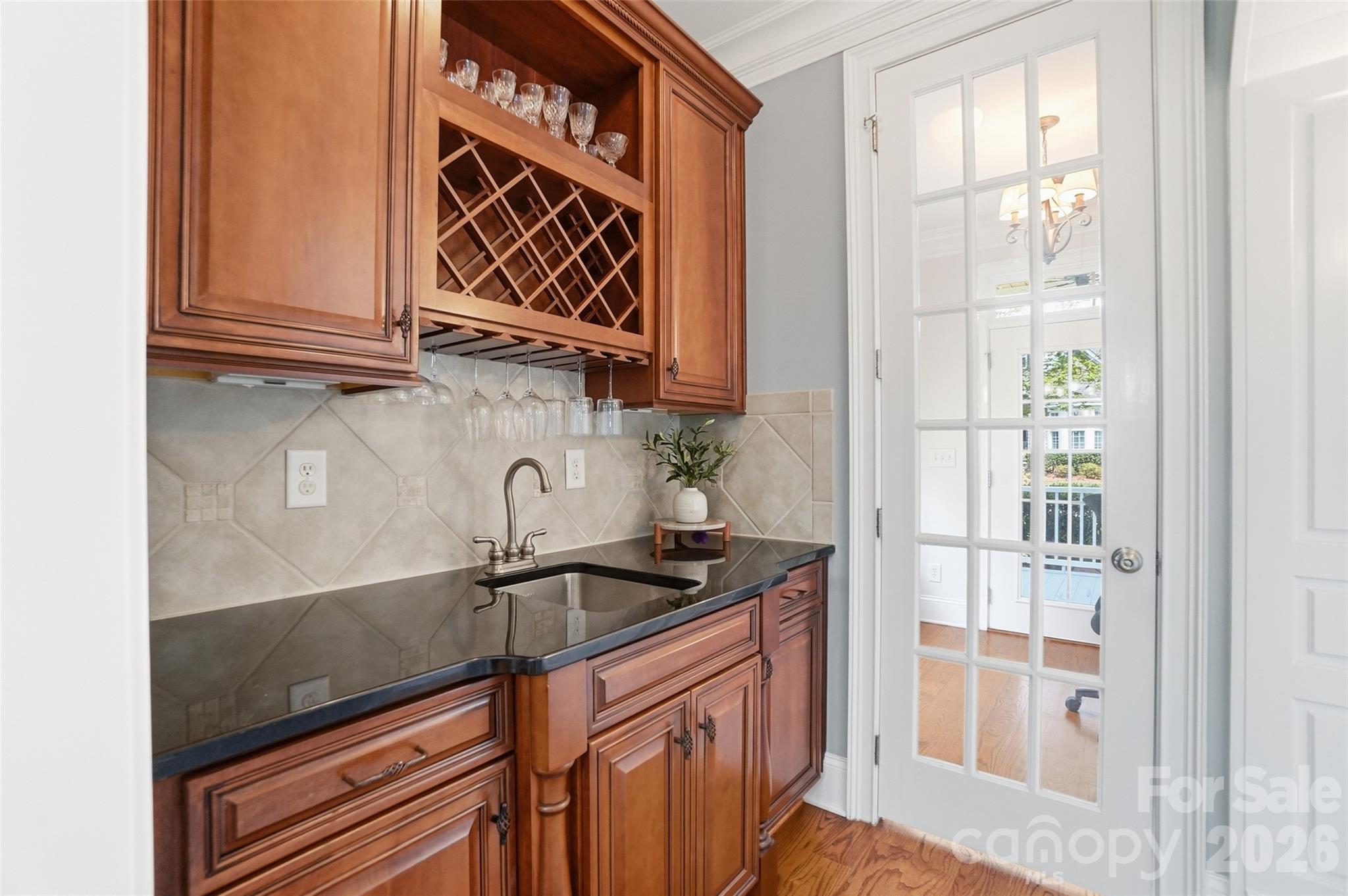 3383 Keady Mill Loop Kannapolis, NC 28081 - Photo 21 of 47 a kitchen with stainless steel appliances granite countertop a sink and a microwave