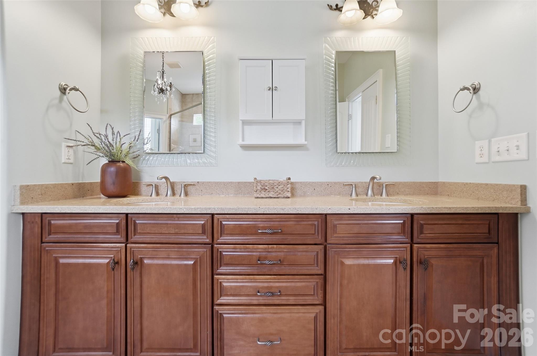 3383 Keady Mill Loop Kannapolis, NC 28081 - Photo 26 of 47 a bathroom with a sink and a mirror
