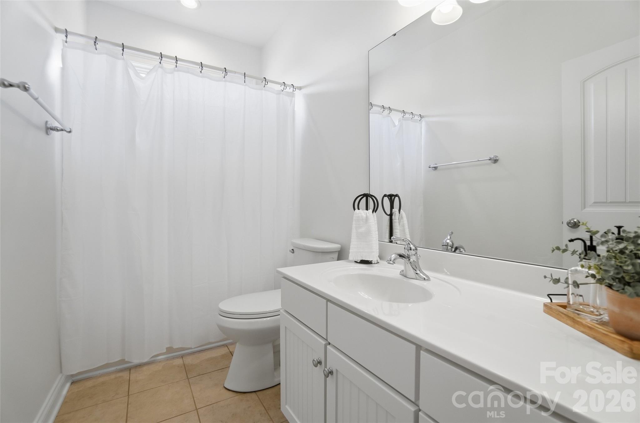 3383 Keady Mill Loop Kannapolis, NC 28081 - Photo 31 of 47 a bathroom with a sink toilet and shower