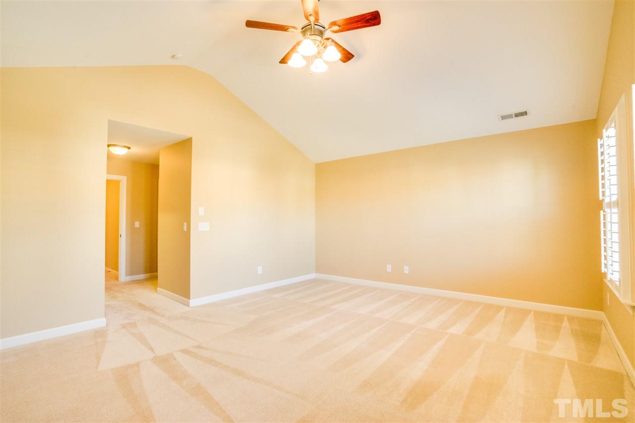 2303 Dunlin Lane Raleigh, NC 27614 - Photo 13 of 25 a view of a big room with a ceiling fan