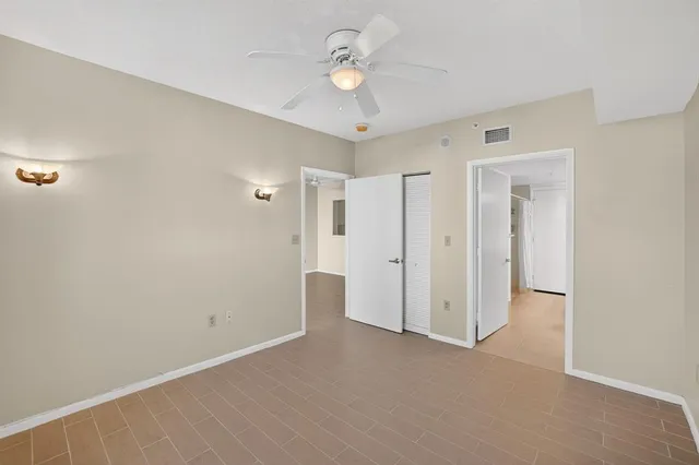 a bathroom with a sink toilet and mirror