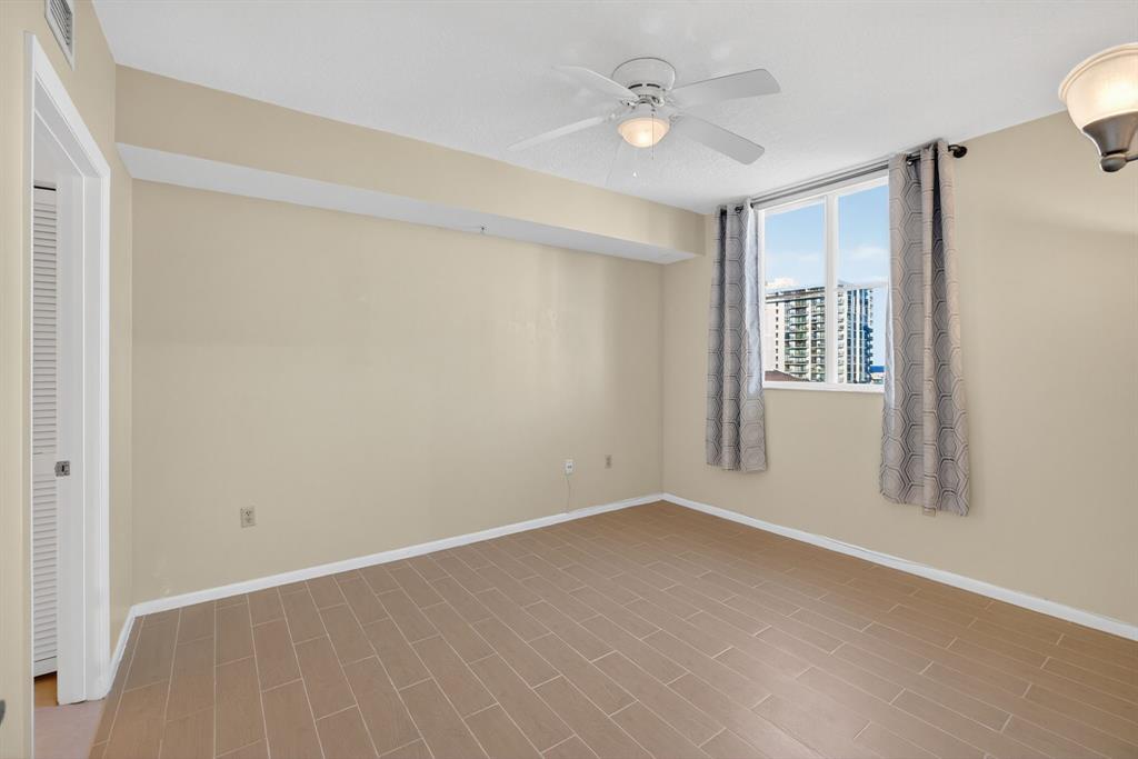 3020 Northeast 32nd Avenue, Unit 819 Fort Lauderdale, FL 33308 - Photo 22 of 68 a view of an empty room with a window