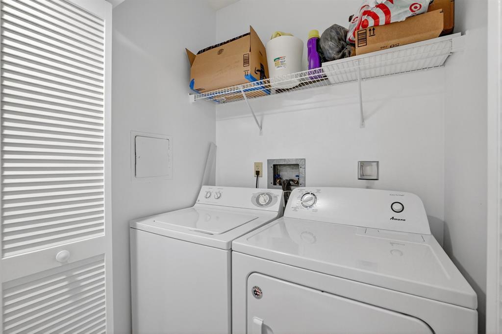 3020 Northeast 32nd Avenue, Unit 819 Fort Lauderdale, FL 33308 - Photo 27 of 68 a utility room with dryer and washer