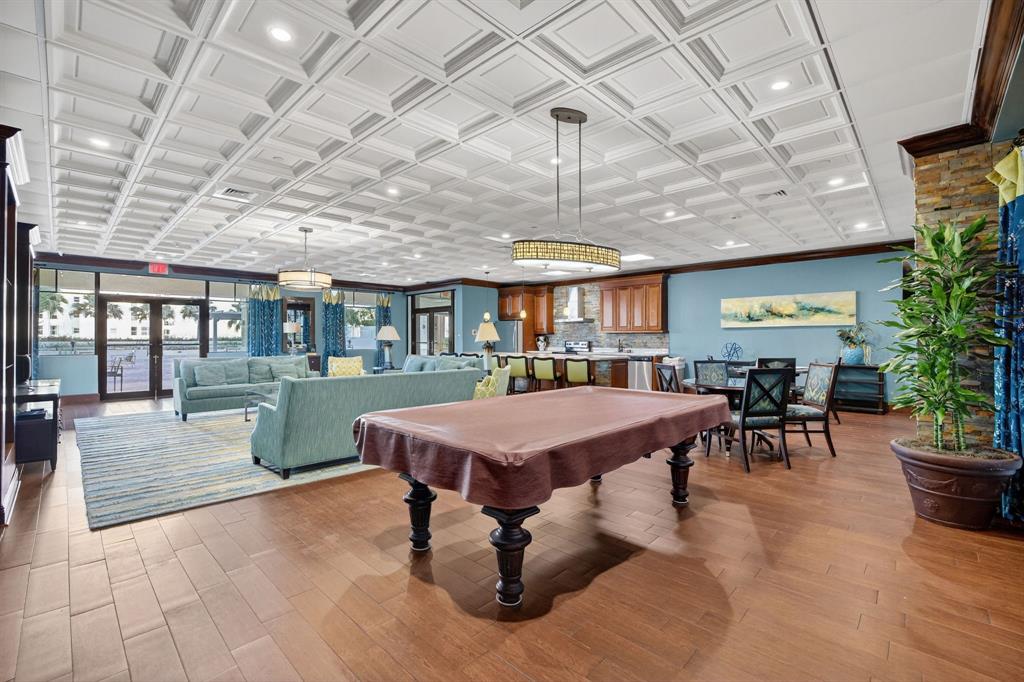 3020 Northeast 32nd Avenue, Unit 819 Fort Lauderdale, FL 33308 - Photo 33 of 68 a dinning table and chairs in a patio