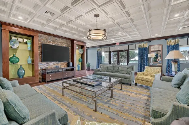 a outdoor space with lots of furniture and glass door