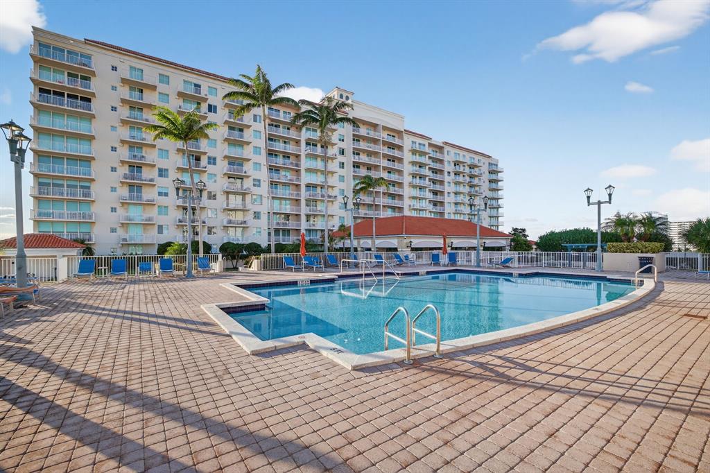 3020 Northeast 32nd Avenue, Unit 819 Fort Lauderdale, FL 33308 - Photo 45 of 68 a view of swimming pool with outdoor seating