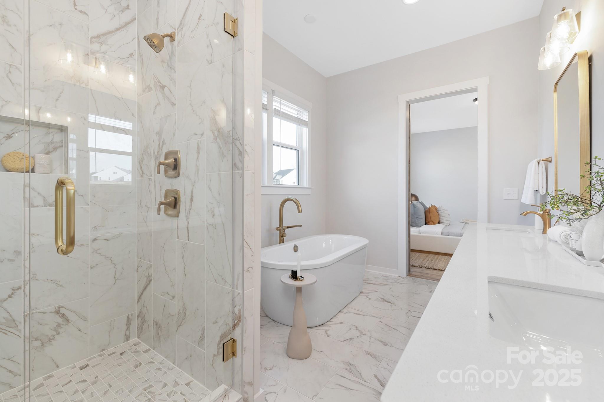 13097 Arnold Palmer Circle, Unit 844 Lancaster, SC 29720 - Photo 19 of 38 a bathroom with a sink a toilet and shower