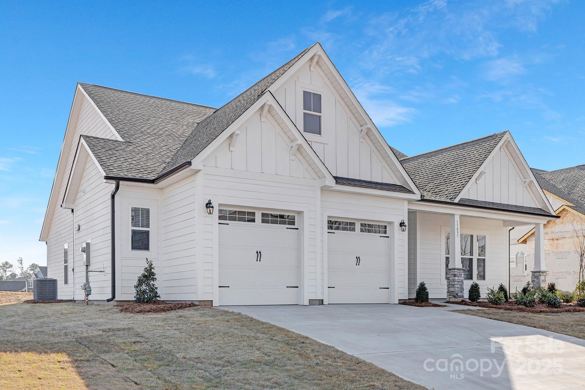 13097 Arnold Palmer Circle, Unit 844 Lancaster, SC 29720 - Photo 2 of 38 a view of a house with a street
