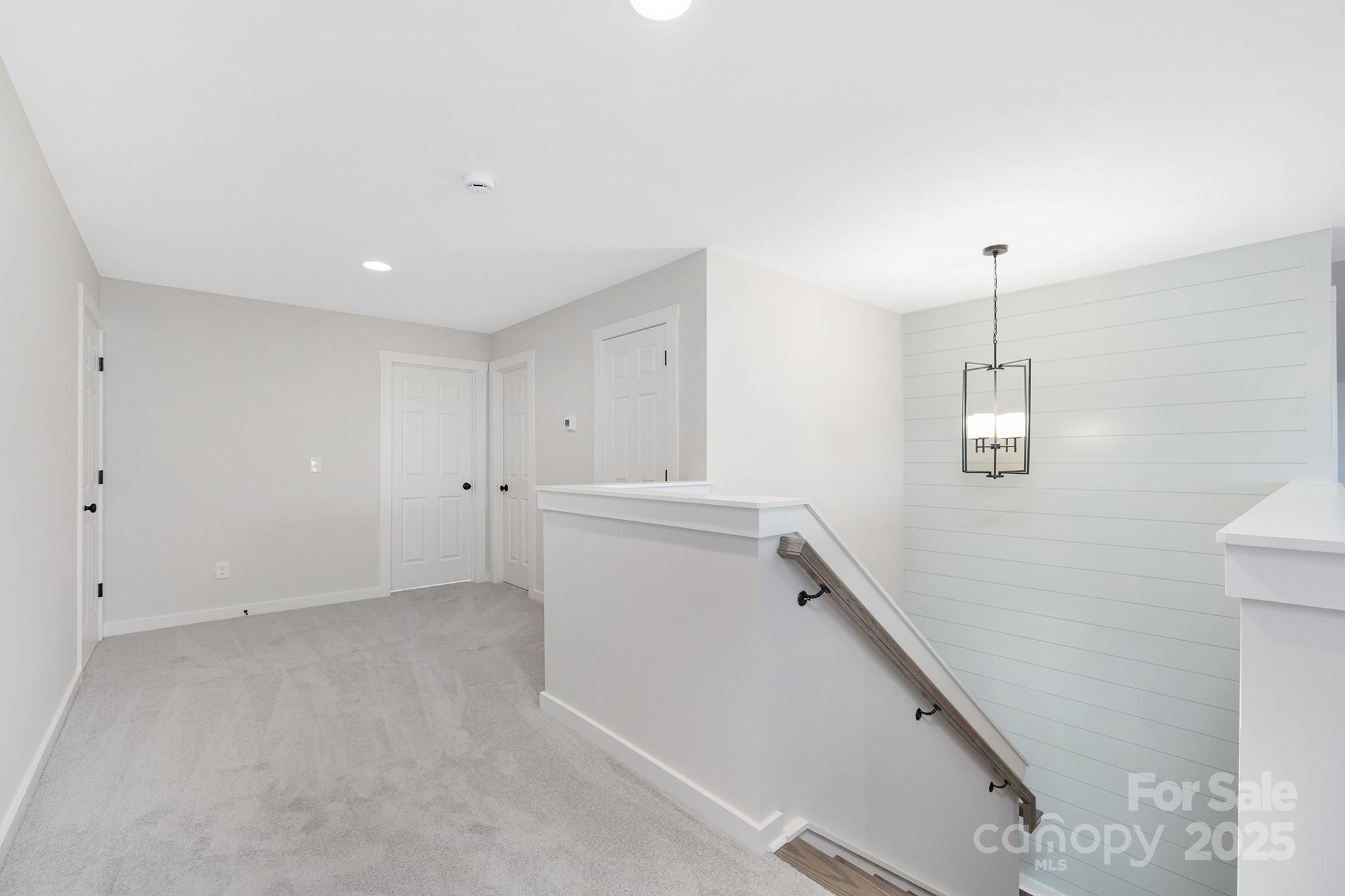 13097 Arnold Palmer Circle, Unit 844 Lancaster, SC 29720 - Photo 24 of 38 a view of a room with window and stairs