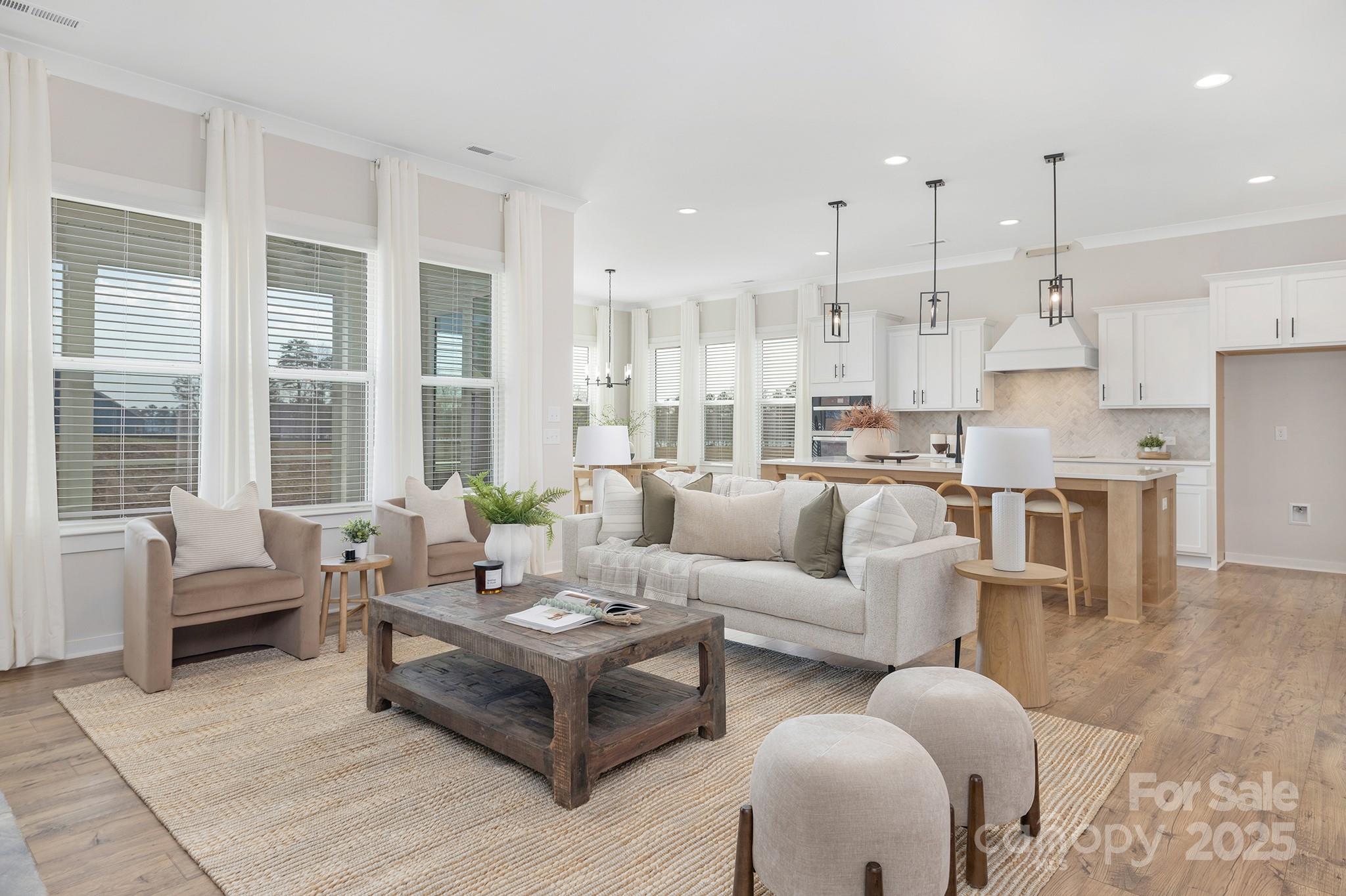 13097 Arnold Palmer Circle, Unit 844 Lancaster, SC 29720 - Photo 10 of 38 a living room with furniture kitchen and a large window