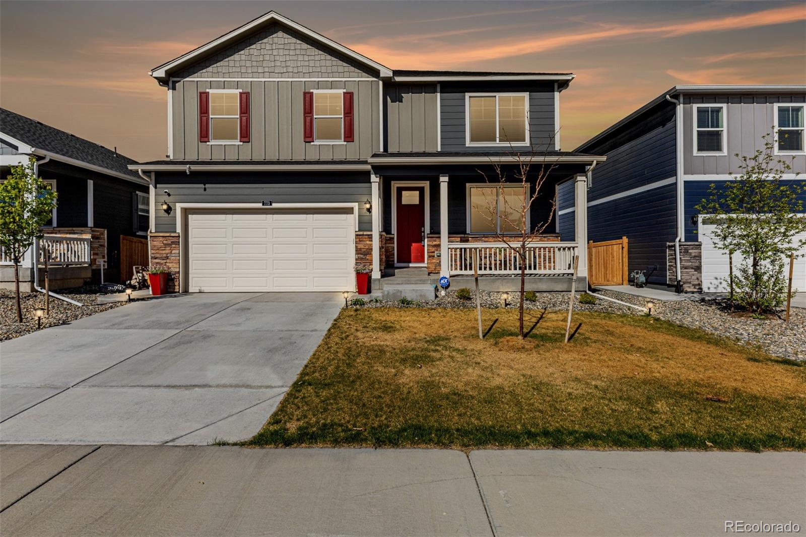 773 Allium Street Watkins, CO 80137 - Photo 46 of 46 a house view with a garden space